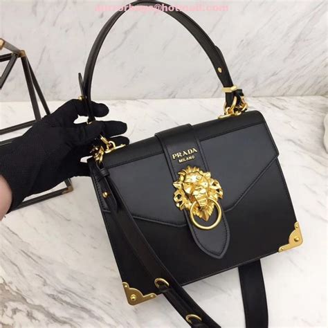 prada lion head bag fake|real prada bag.